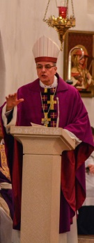 Catholic Bishop Preaching Representing Morally Responsible Investing
