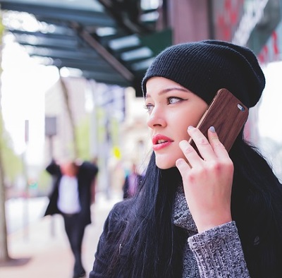 Girl on Phone Calling Investment Advisor after Trying DIY Investing